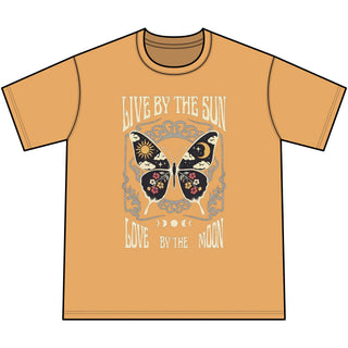 A short-sleeve crewneck t-shirt in a warm ochre orange color, featuring a central graphic of a butterfly with a sun and moon motif, surrounded by the text 'LIVE BY THE SUN' and 'LOVE BY THE MOON' on a white background.