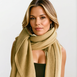 Woman wearing The Haven Cashmere Jersey Stole™ in camel