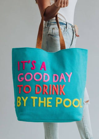 Aqua woven Drink By The Pool tote with summer poolside detail