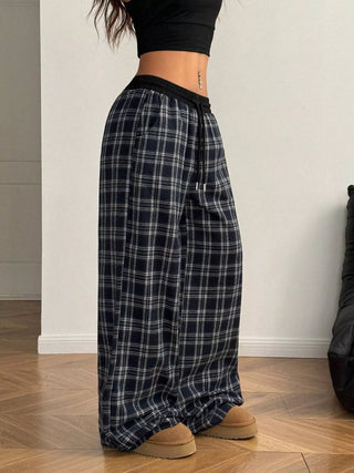Navy plaid wide-leg pants, side view