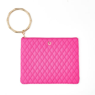 Front view of the Tickled Pink quilted Big O bracelet pouch with gold circular handle