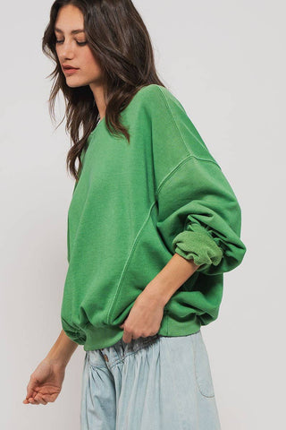 Crew Neck Comfort Washed Sweatshirt styled with denim from Fitkitty Culture