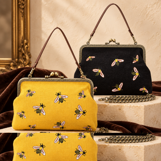 Yellow and black Bee Charm Kisslock Bags with scattered embroidered bees