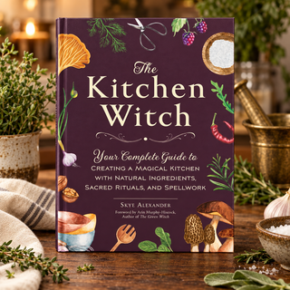 The Kitchen Witch by Skye Alexander displayed on a warm kitchen counter