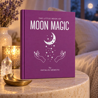 The Little Book of Moon Magic in a serene moonlit bedside setting