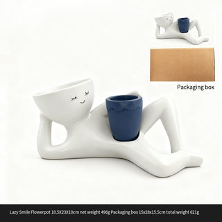 The Little Pause Sculptural Planter with blue pot