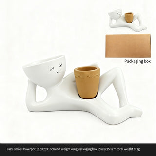 The Little Pause Sculptural Planter with golden yellow pot