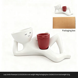 The Little Pause Sculptural Planter with plum pot