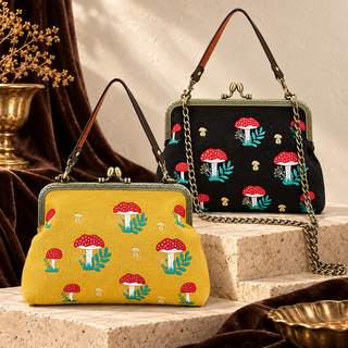 Yellow and black Mushrooms Kisslock Bags with red mushroom embroidery