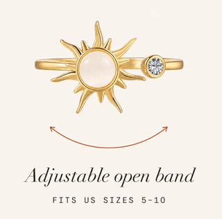 Solstice Spinner Ring in gold showing adjustable open band and rotating sun design