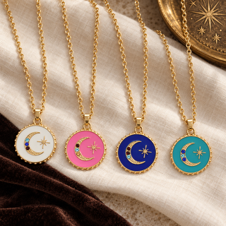 Sparkling Moon Enamel Charm Necklaces in White, Happy Pink, Royal Blue and Aqua on cream linen