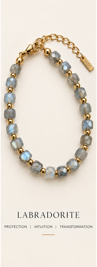 Stone Stack Labradorite faceted gemstone and gold beaded bracelet on a luxe cream background